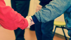 group holding hands