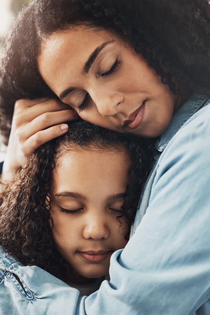 Mom and daughter hugging